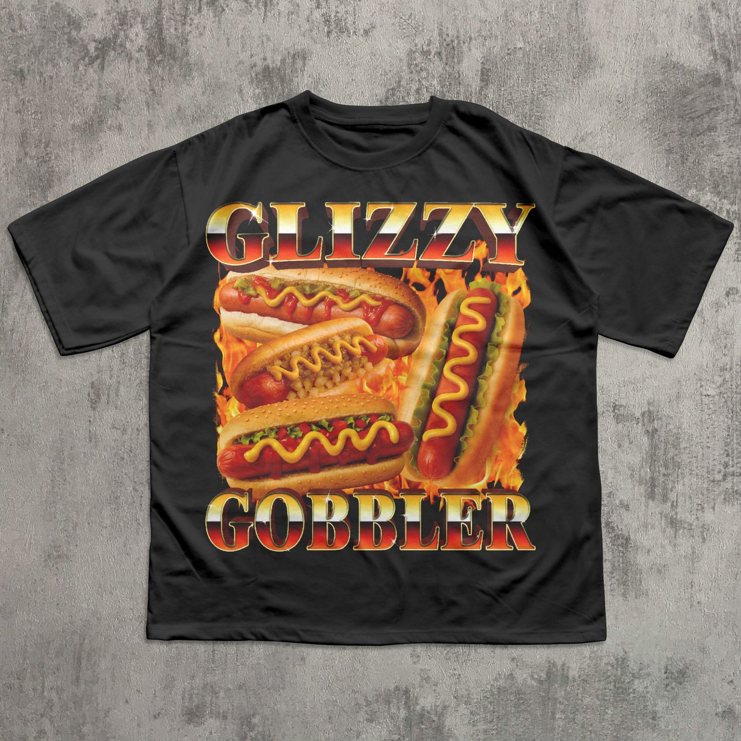 Black t-shirt with 'Glizzy Gobbler' hot dog graphic on a textured gray background