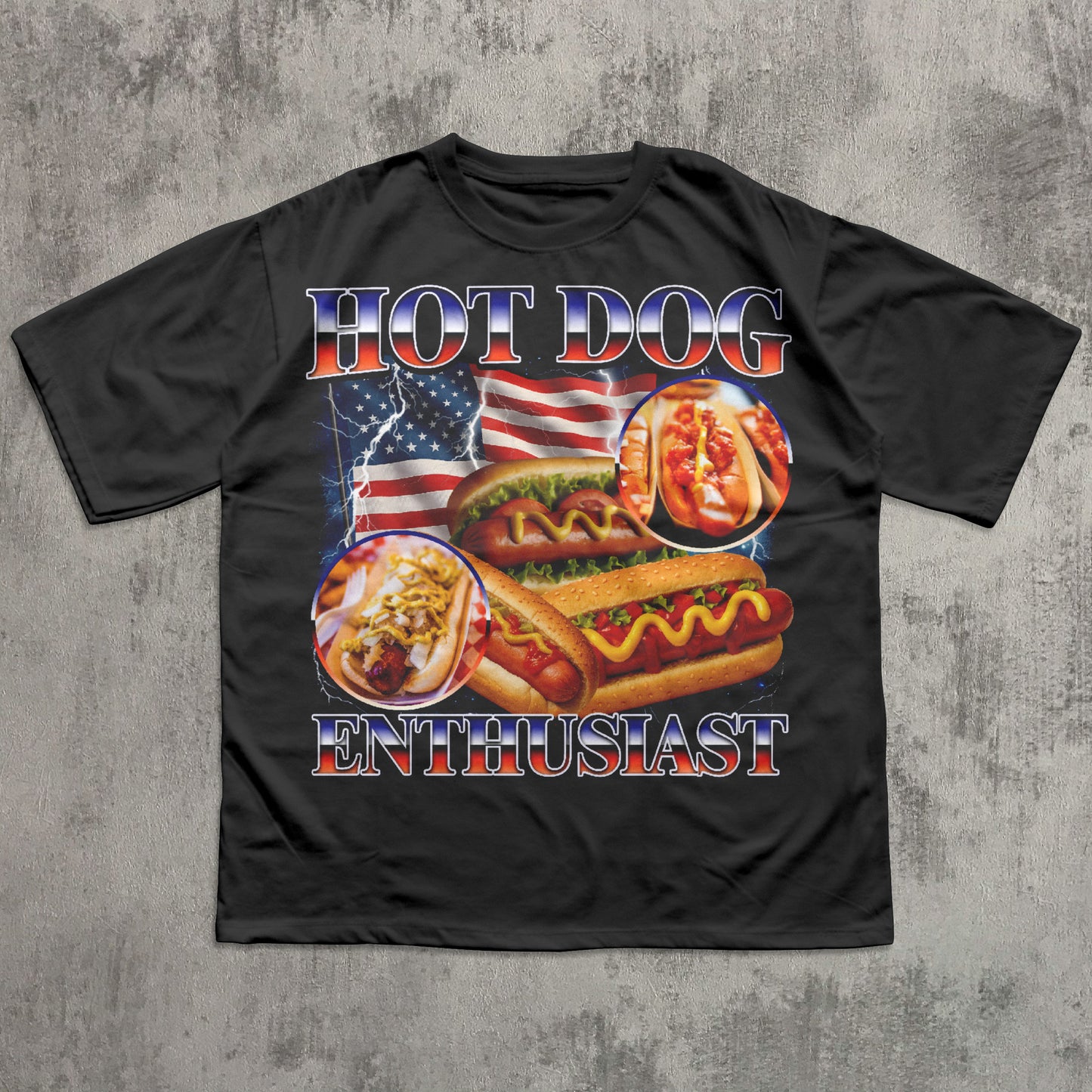 Black t-shirt with hot dog graphic and 'Hot Dog Enthusiast' text on a concrete background