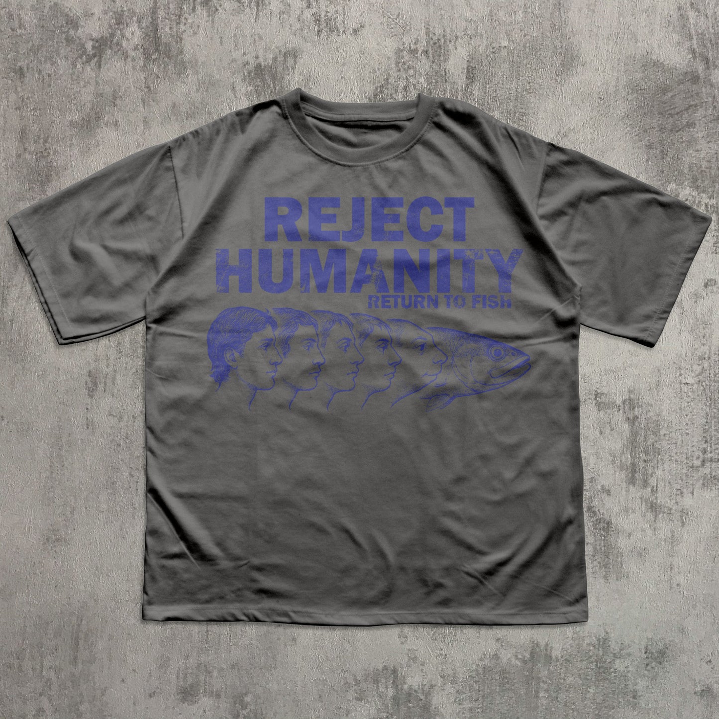 Gray t-shirt with blue text and graphic on a textured gray background