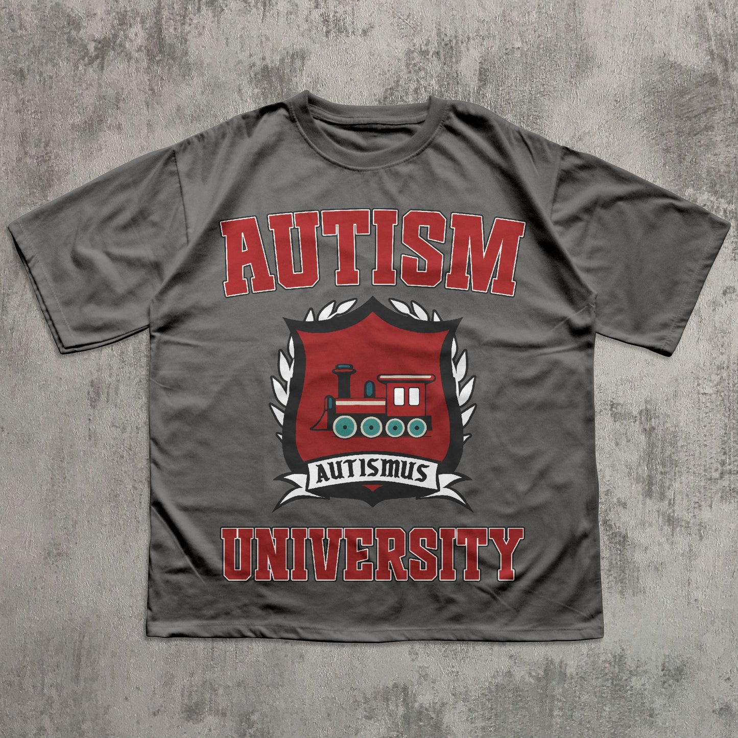 Gray t-shirt with 'Autism University' text and emblem on a textured gray background