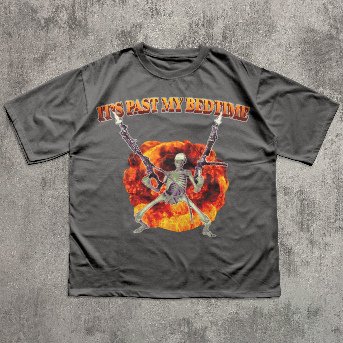 Funny Gray t-shirt with skeleton holding guns and 'It's Past My Bedtime' text on a concrete background