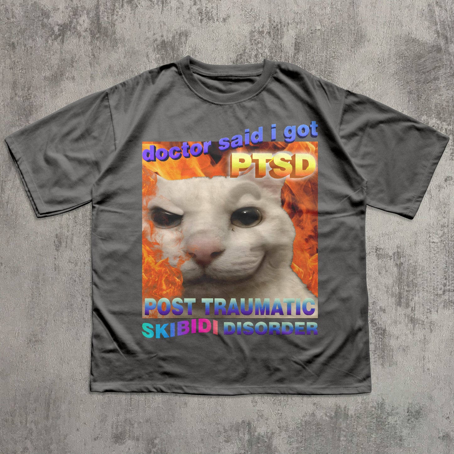 Funny skibidi Gray t-shirt with a graphic of a cat and text on a concrete background