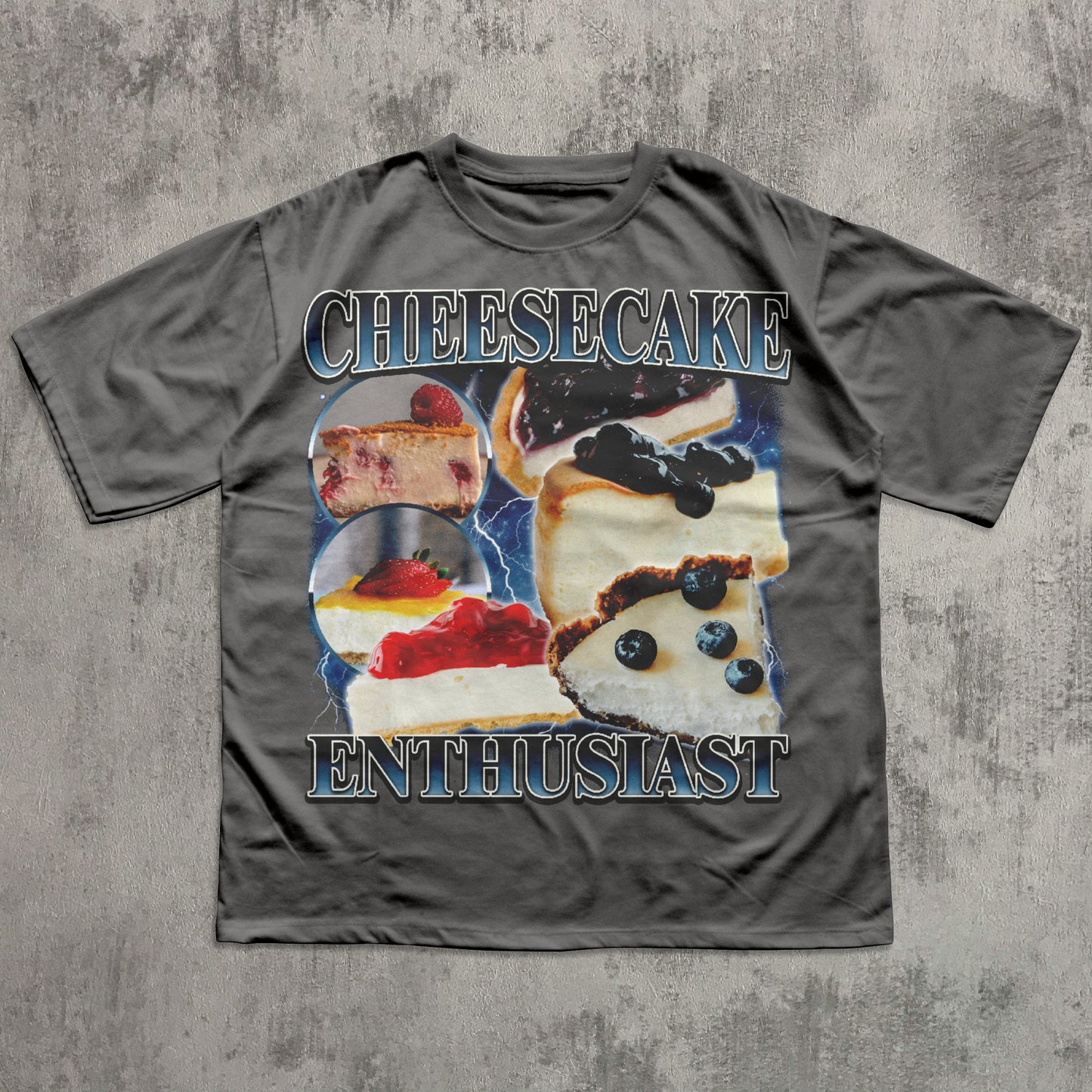 Gray t-shirt with cheesecake graphic and text on a textured gray background