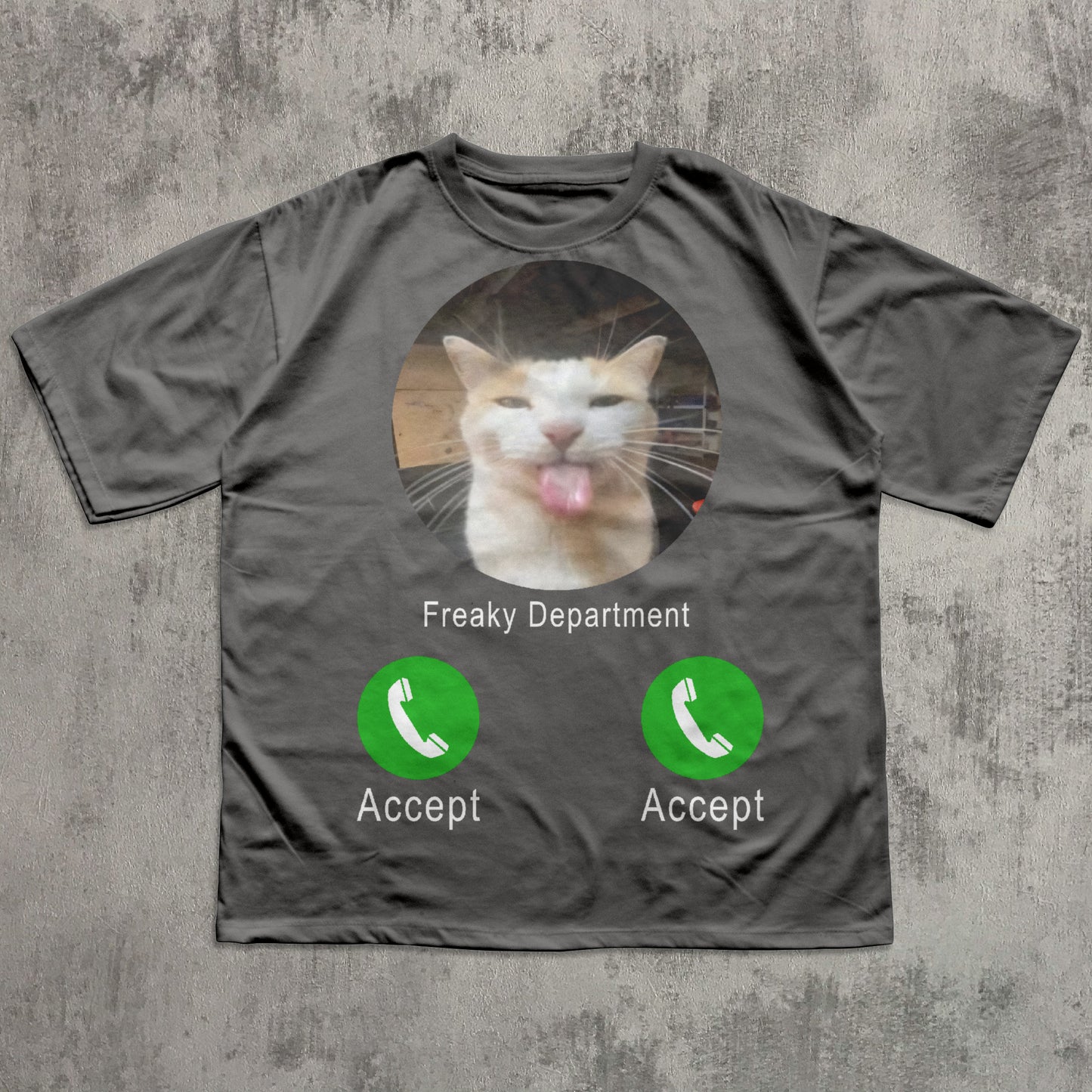 Gray t-shirt with a cat graphic and 'Freaky Department' text on a textured gray background