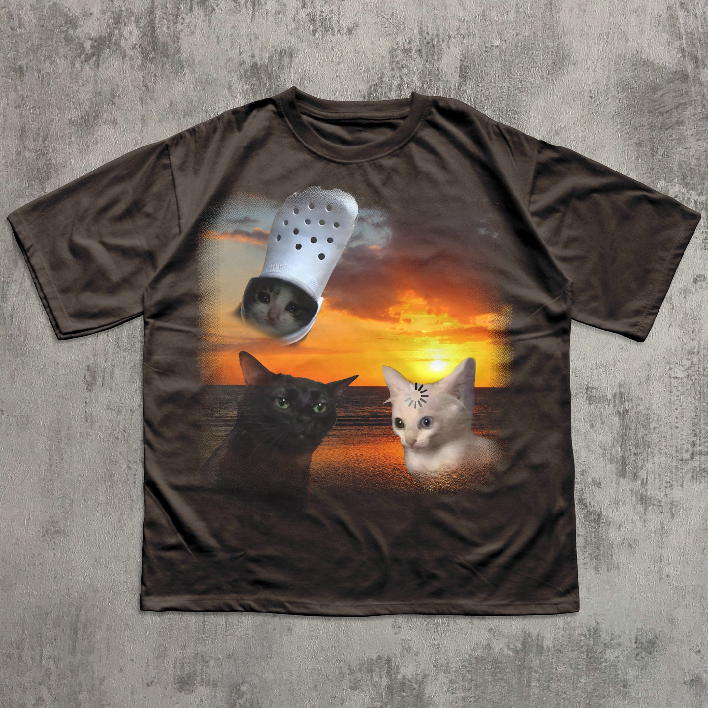 Brown t-shirt with two cats and a Croc shoe design on a sunset background