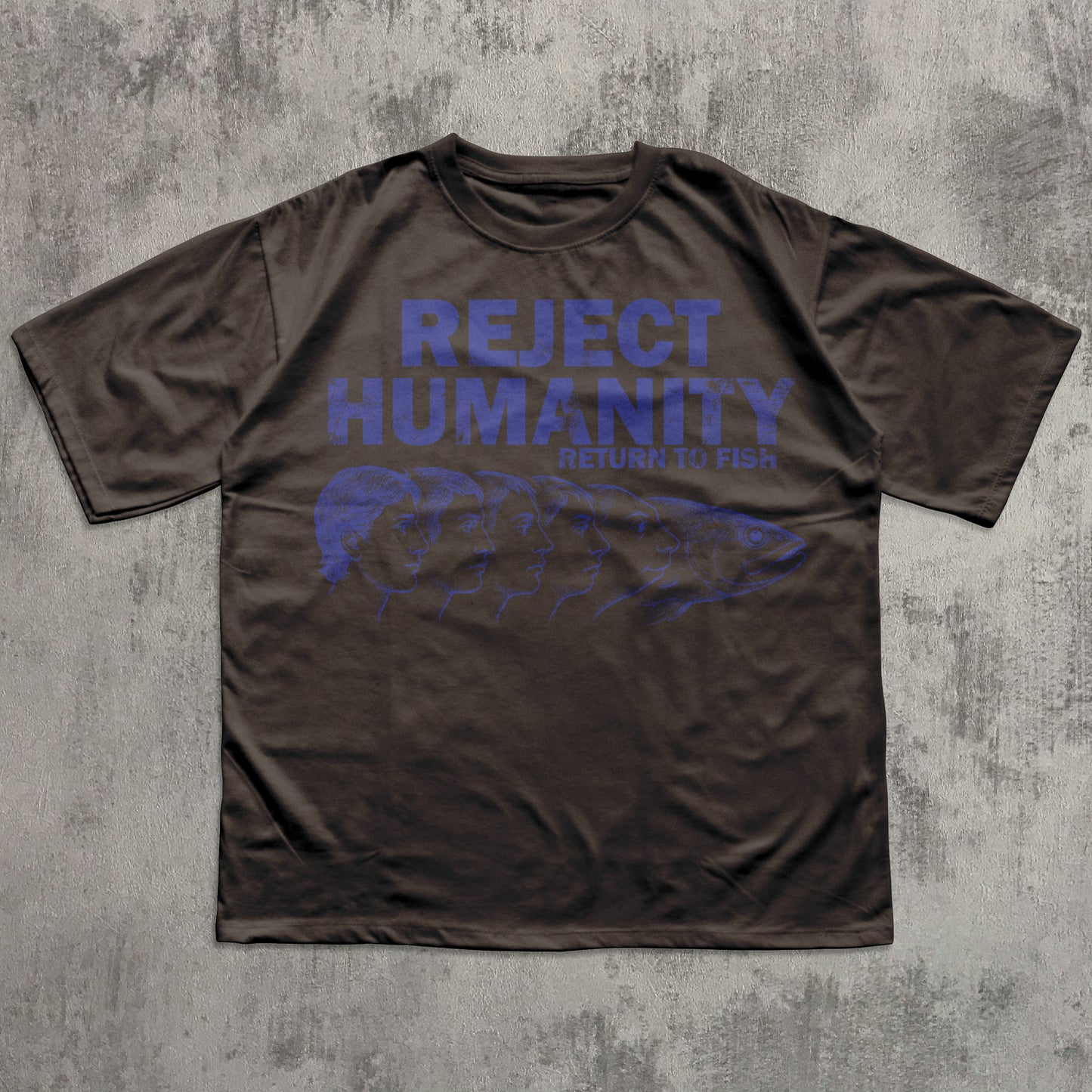 Brown t-shirt with blue text and graphic on a textured gray background