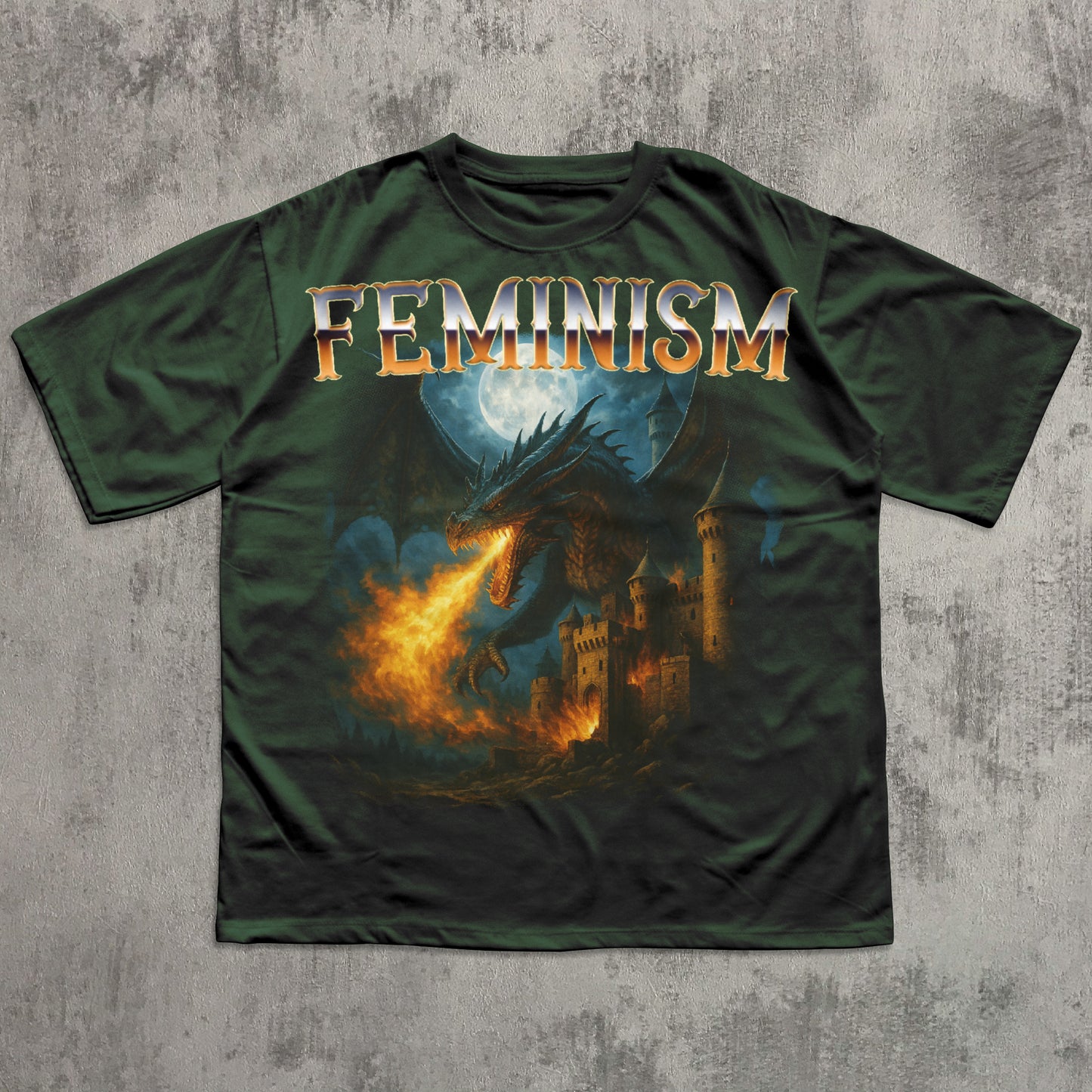 Green t-shirt with 'Feminism' text and dragon design on a textured gray background
