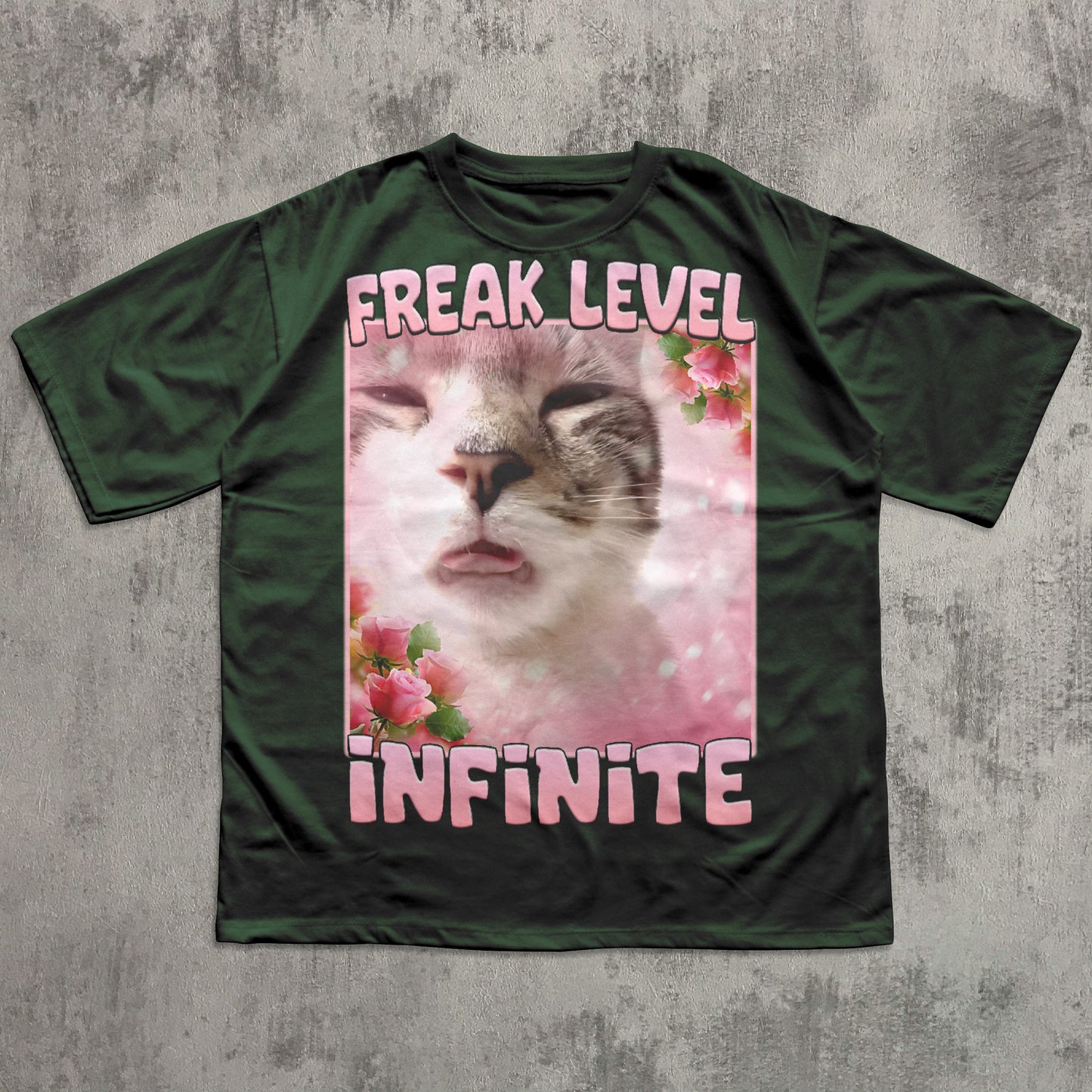 Funny Green t-shirt with a cat graphic and text 'Freak Level Infinite' on a textured gray background