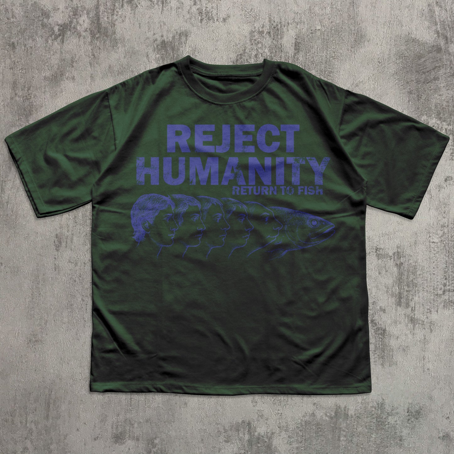 Green t-shirt with blue text and graphic on a textured gray background