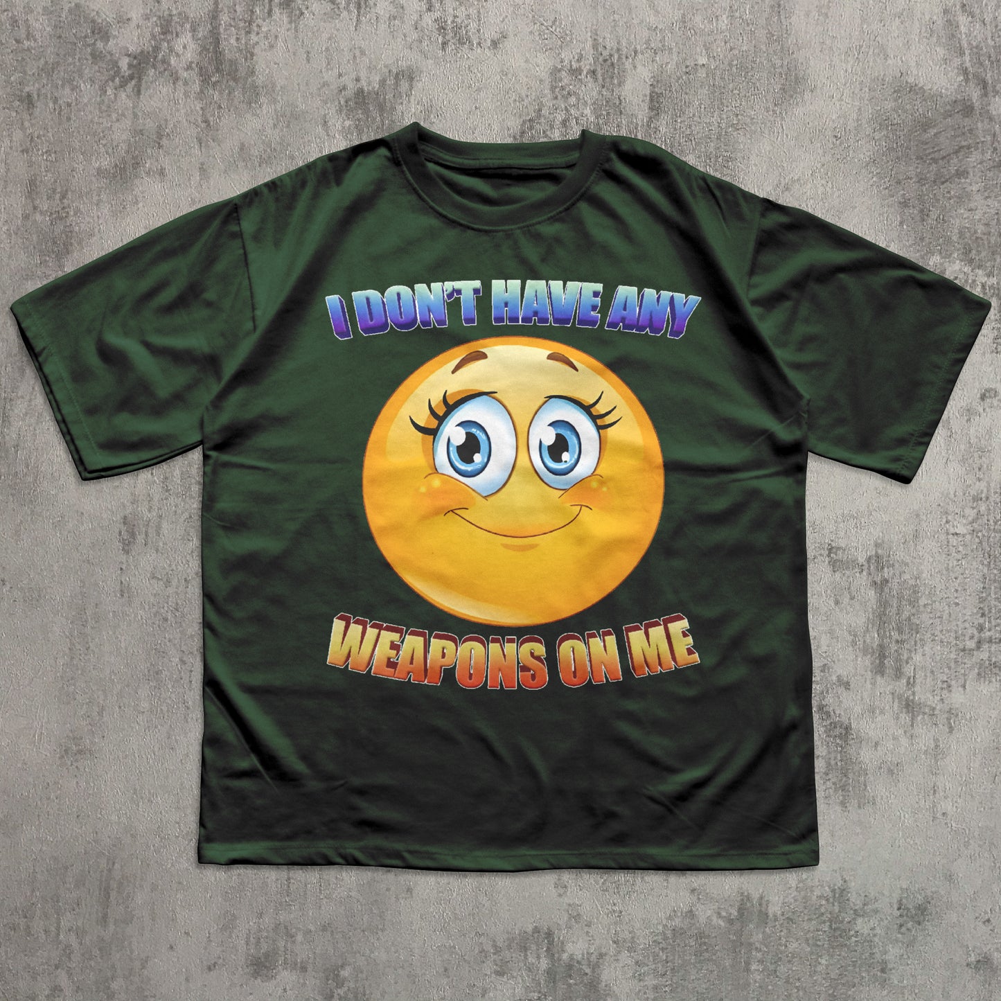 Green t-shirt with a smiley face and text on a gray textured background