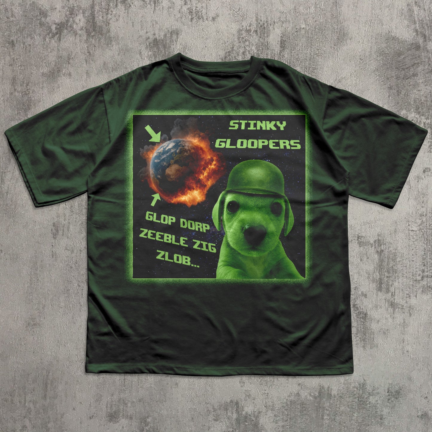 Green funny t-shirt with a graphic design featuring a alien dog in a helmet and text on a concrete background