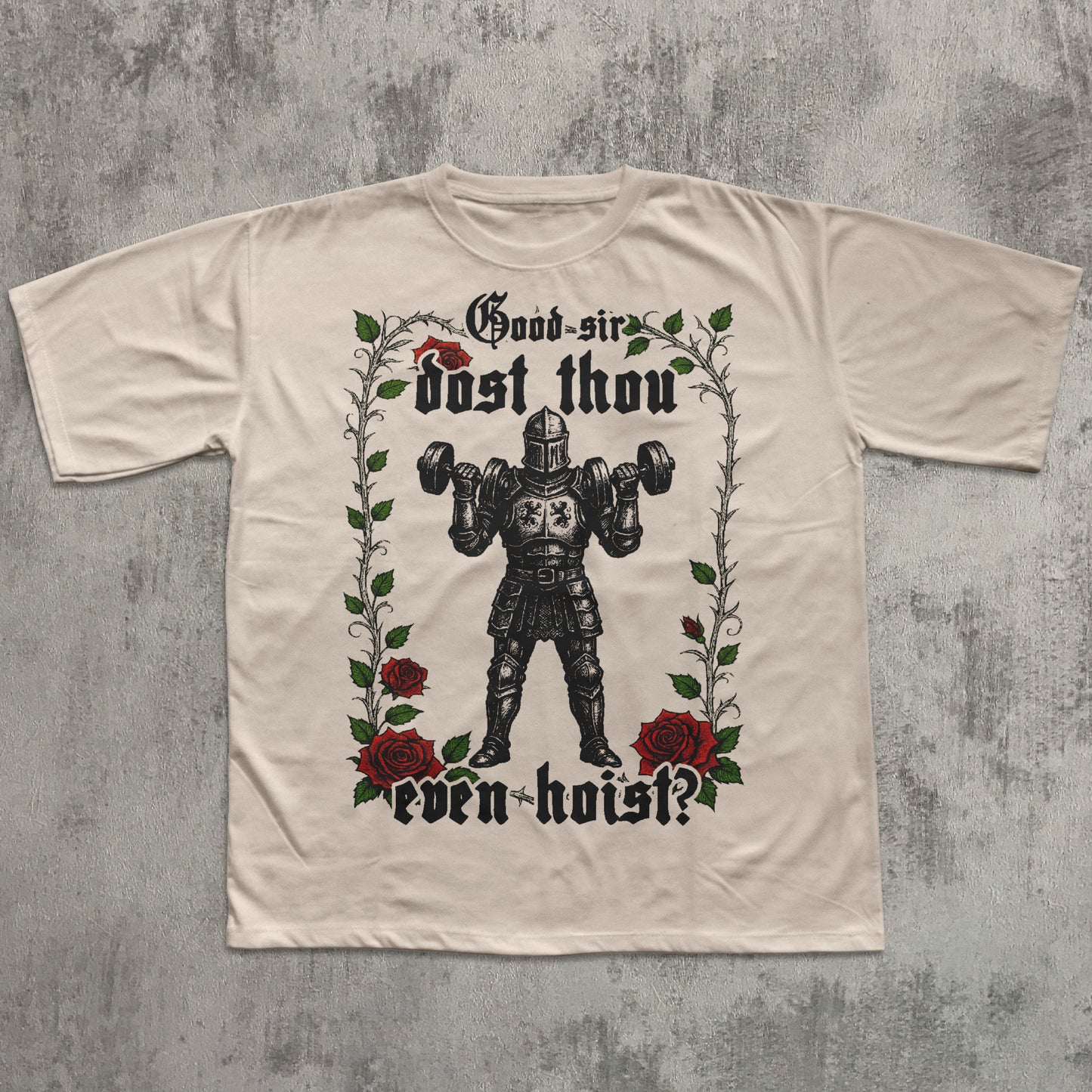 Beige t-shirt with a graphic design of a knight lifting weights and roses on a textured gray background