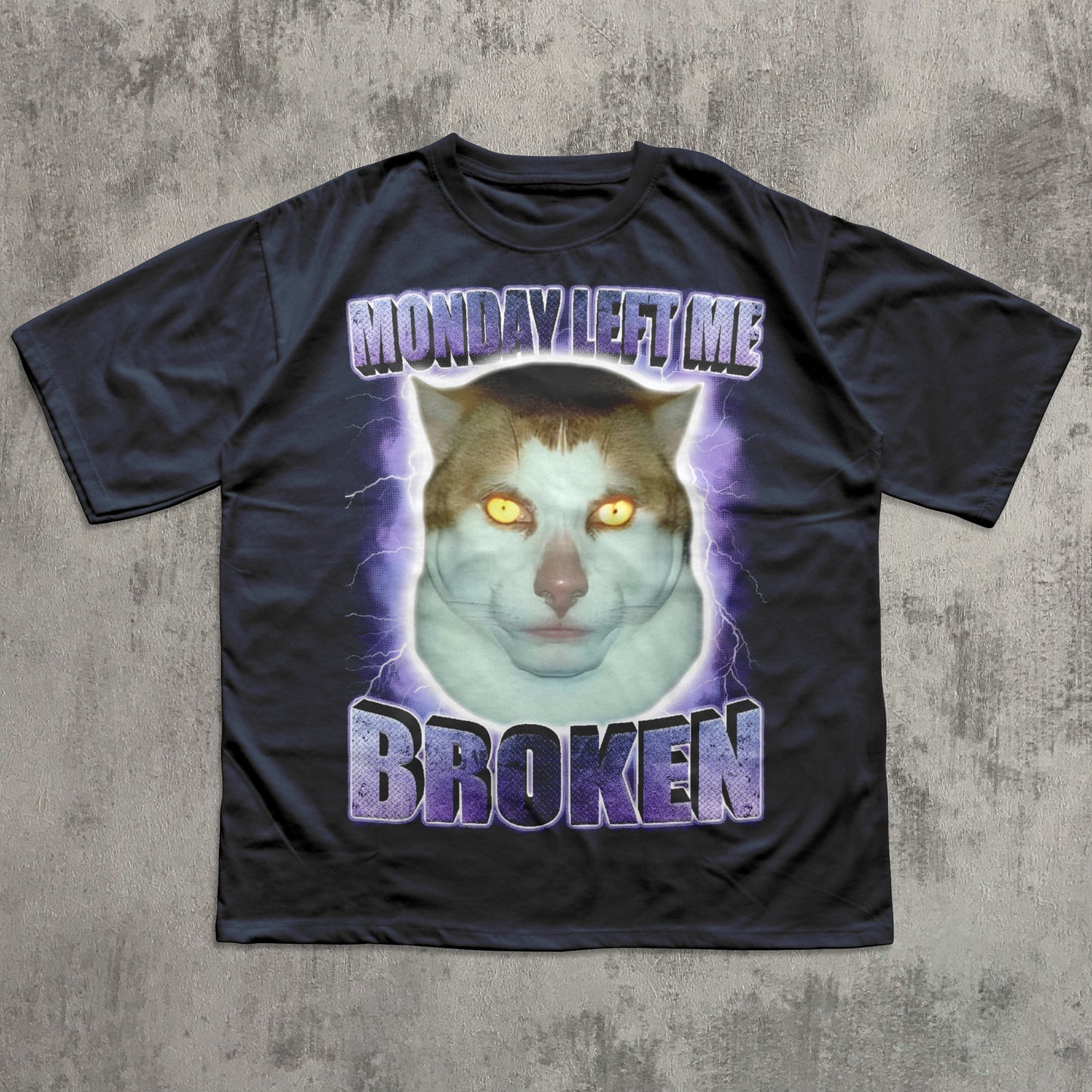 Navy Funny t-shirt with a graphic of a cat and text 'Monday Left Me Broken' on a textured gray background
