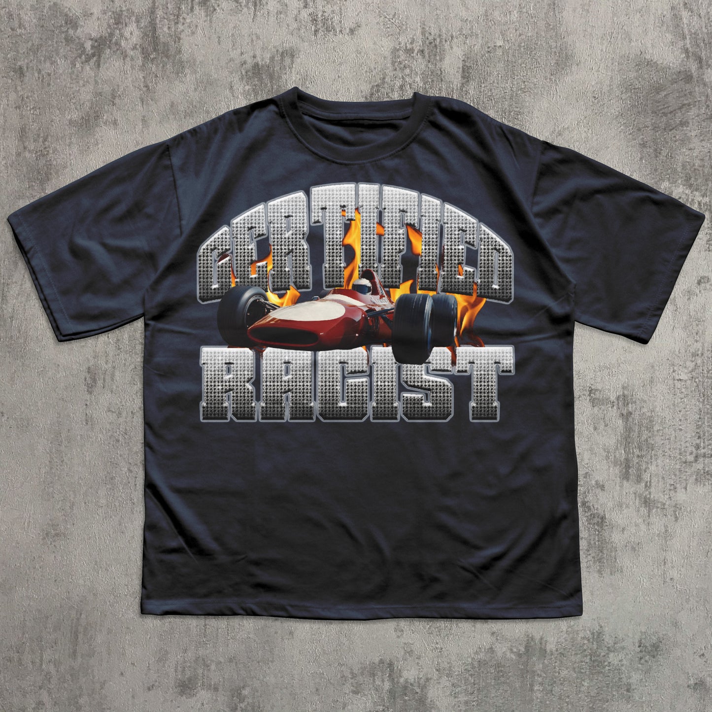 Black t-shirt with a graphic design and text on a textured gray background