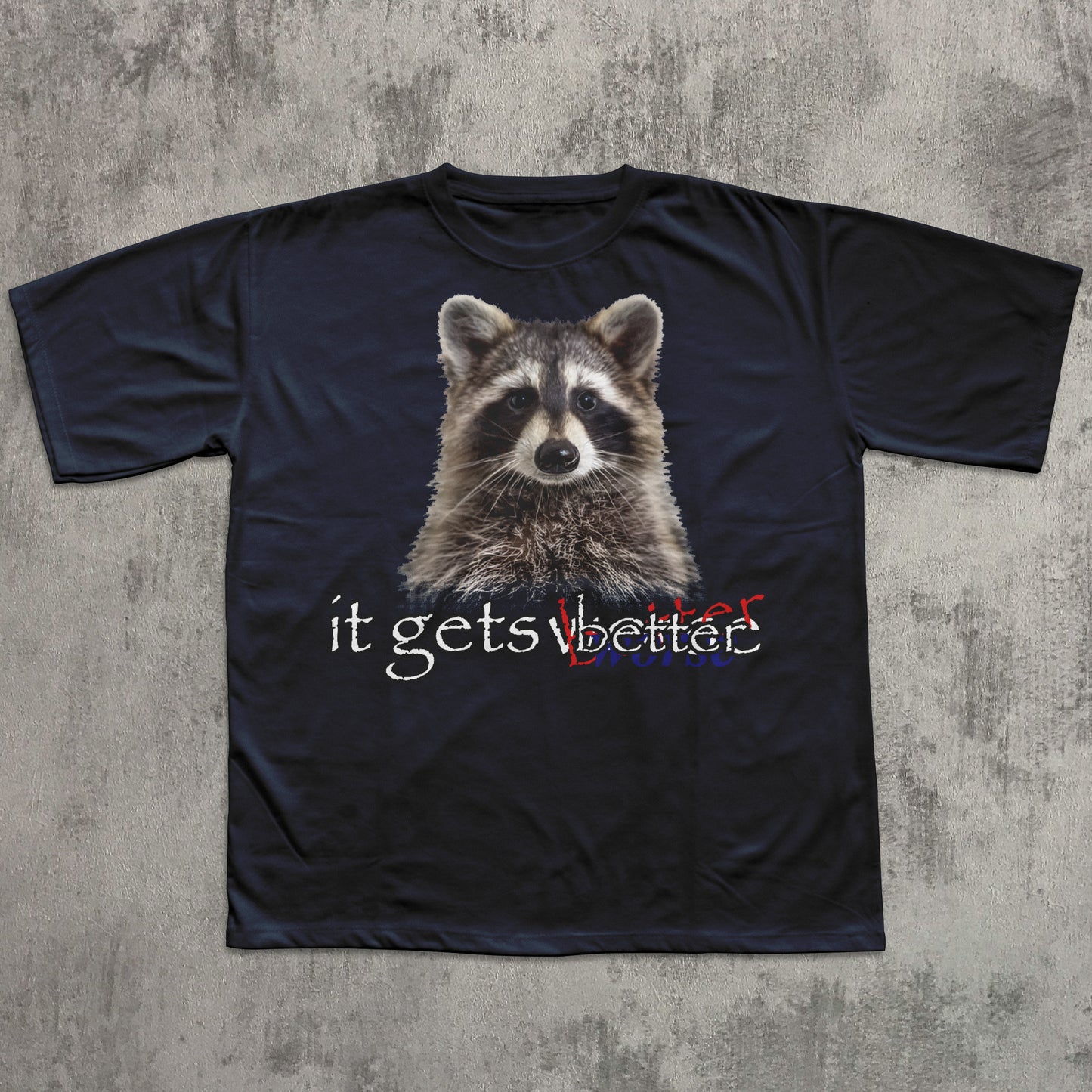 Black t-shirt with a raccoon graphic and 'it gets better' text on a textured gray background