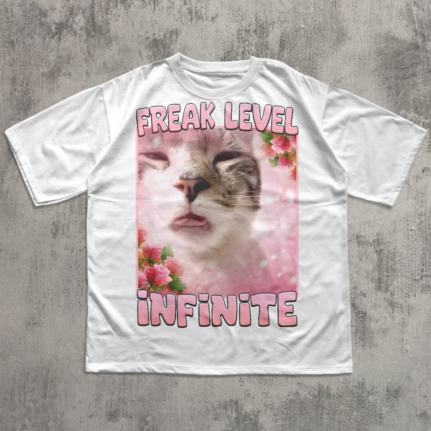 Funny White t-shirt with a cat graphic and text on a concrete surface
