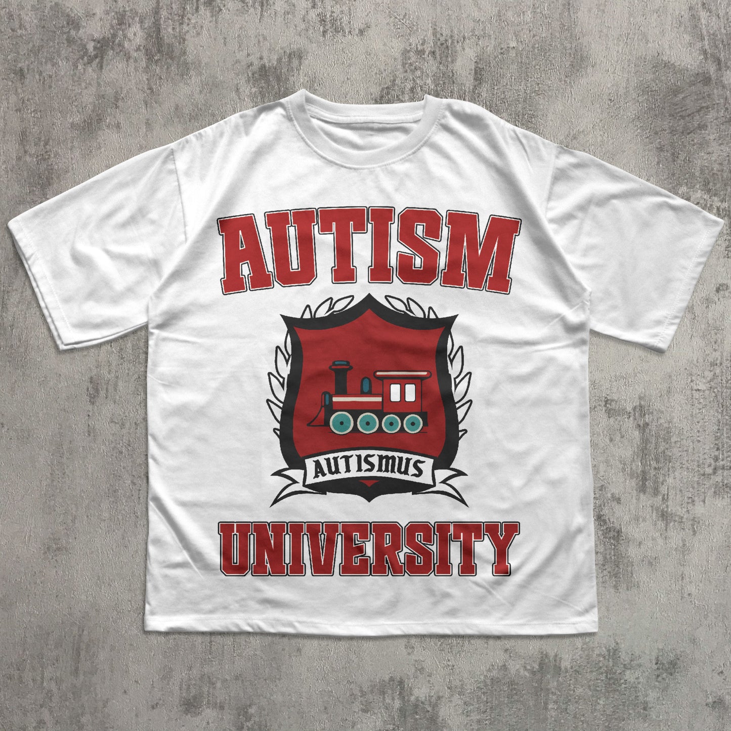 White t-shirt with 'Autism University' design featuring a red and black emblem on a concrete background.
