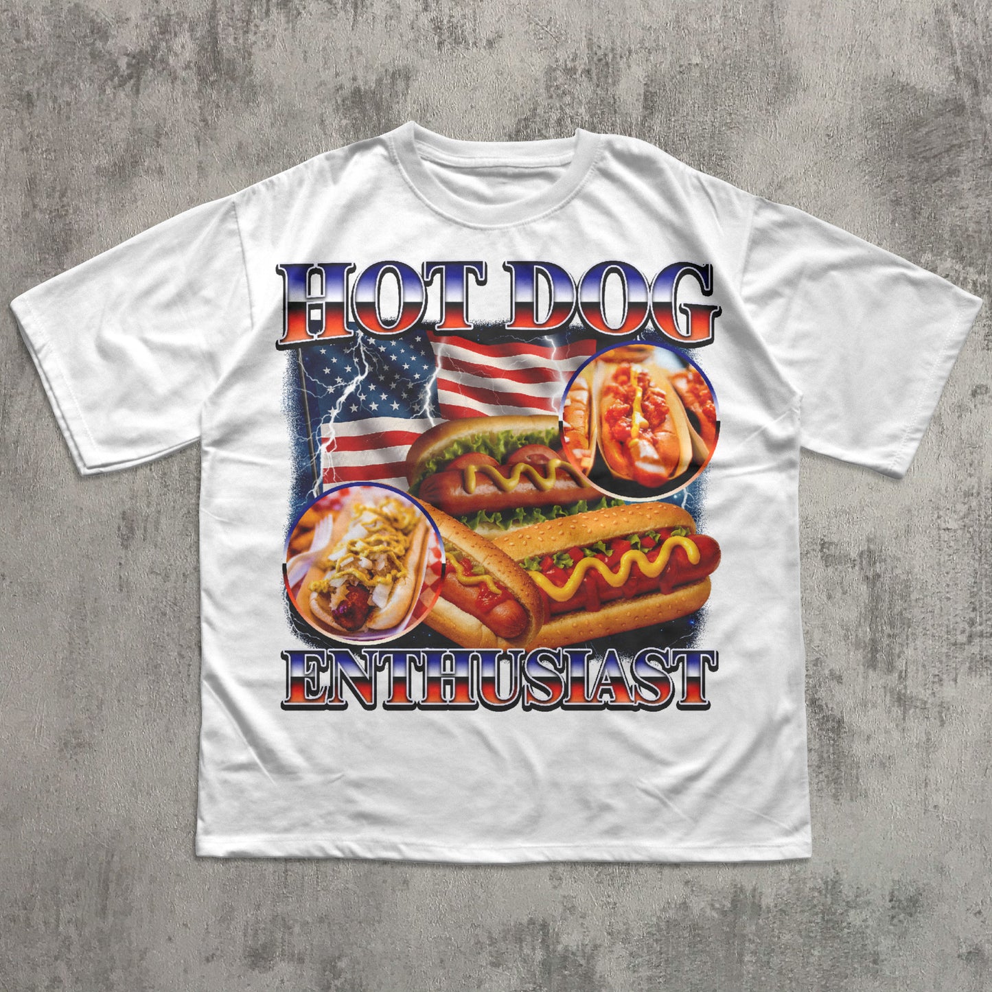 White t-shirt with hot dog graphic and 'Hot Dog Enthusiast' text on a concrete surface