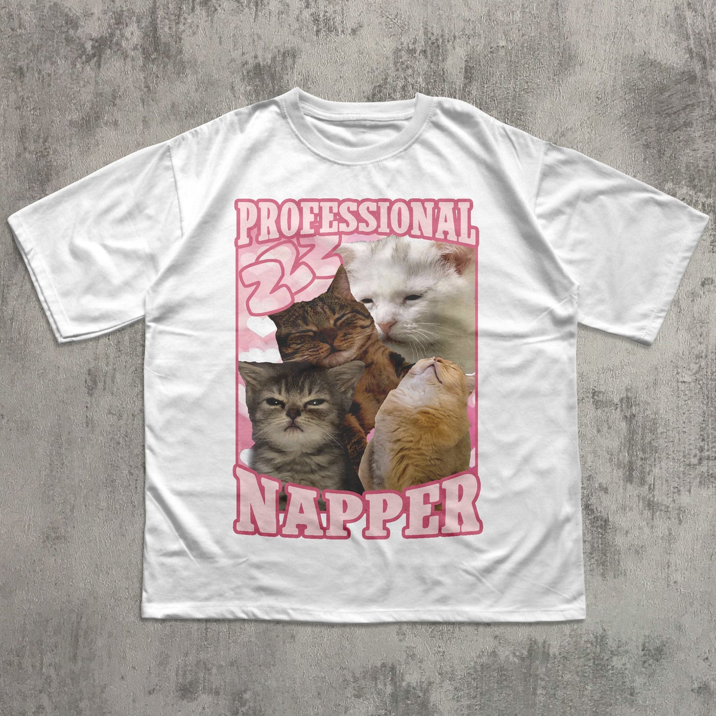 Funny White t-shirt with a graphic of cats and the text 'Professional Napper' on a concrete surface.
