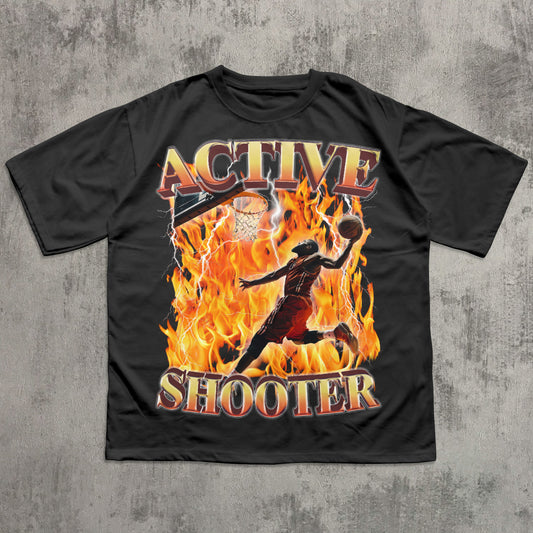 funny Black t-shirt with 'Active Shooter' graphic design on a textured gray background
