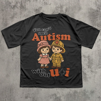 Black t-shirt with cartoon characters and text on a textured gray background