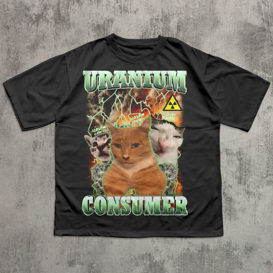 Black t-shirt with a graphic design featuring a fox and text 'Uranium Consumer' on a textured gray background.