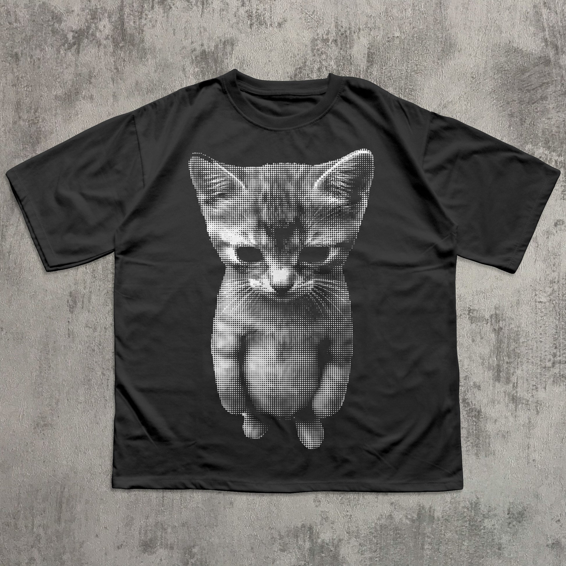 Halftone kitten graphic tee featuring a detailed dot art cat illustration