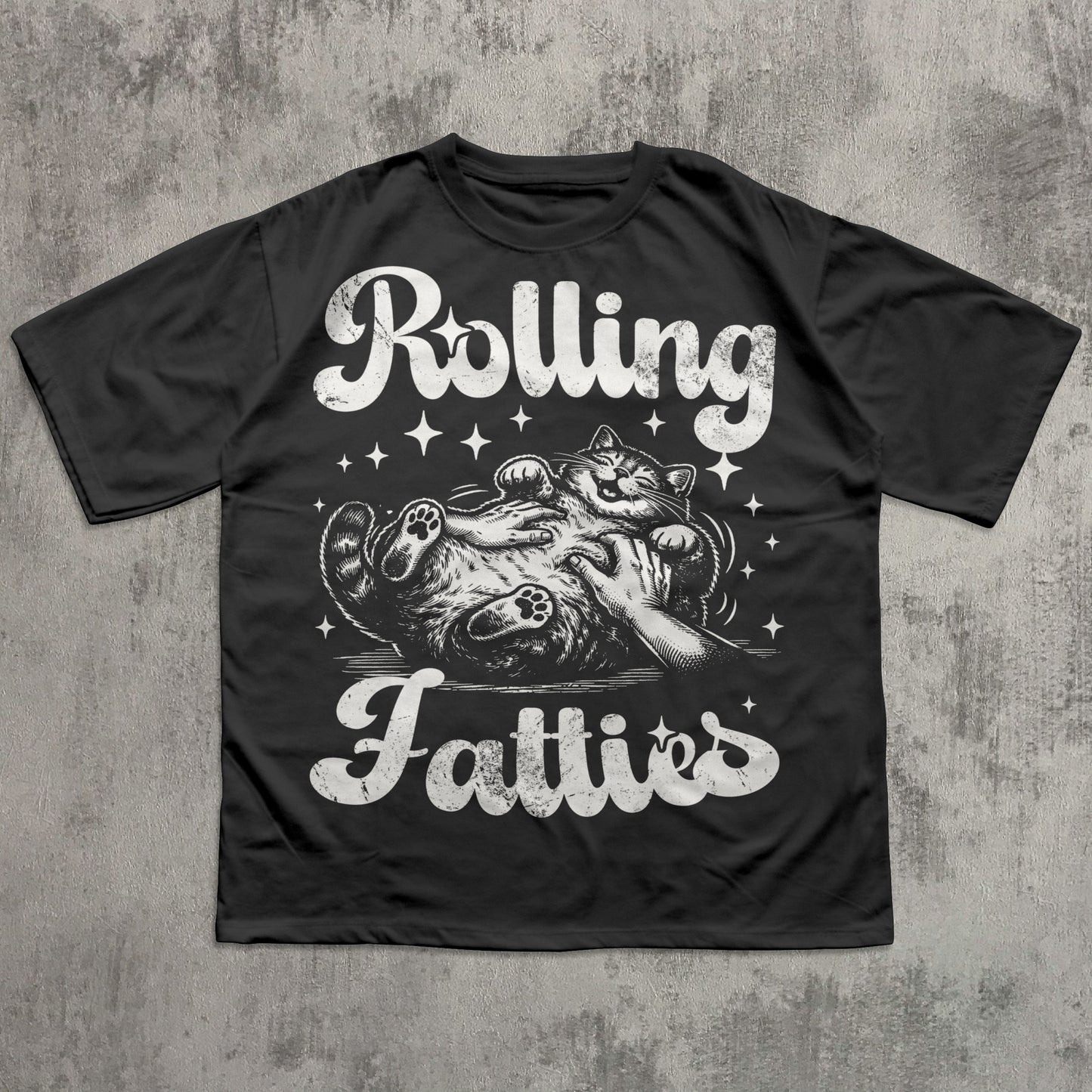 Black t-shirt with graphic design and text 'Rolling Fatties' on a textured gray background