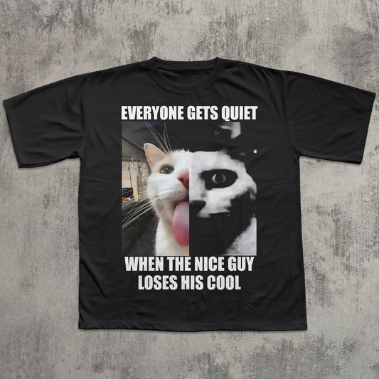 Black t-shirt with a graphic of two cats and text on a textured gray background
