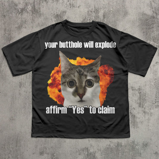 Funny meme Black t-shirt with a graphic of a cat's face surrounded by flames and text on a concrete background