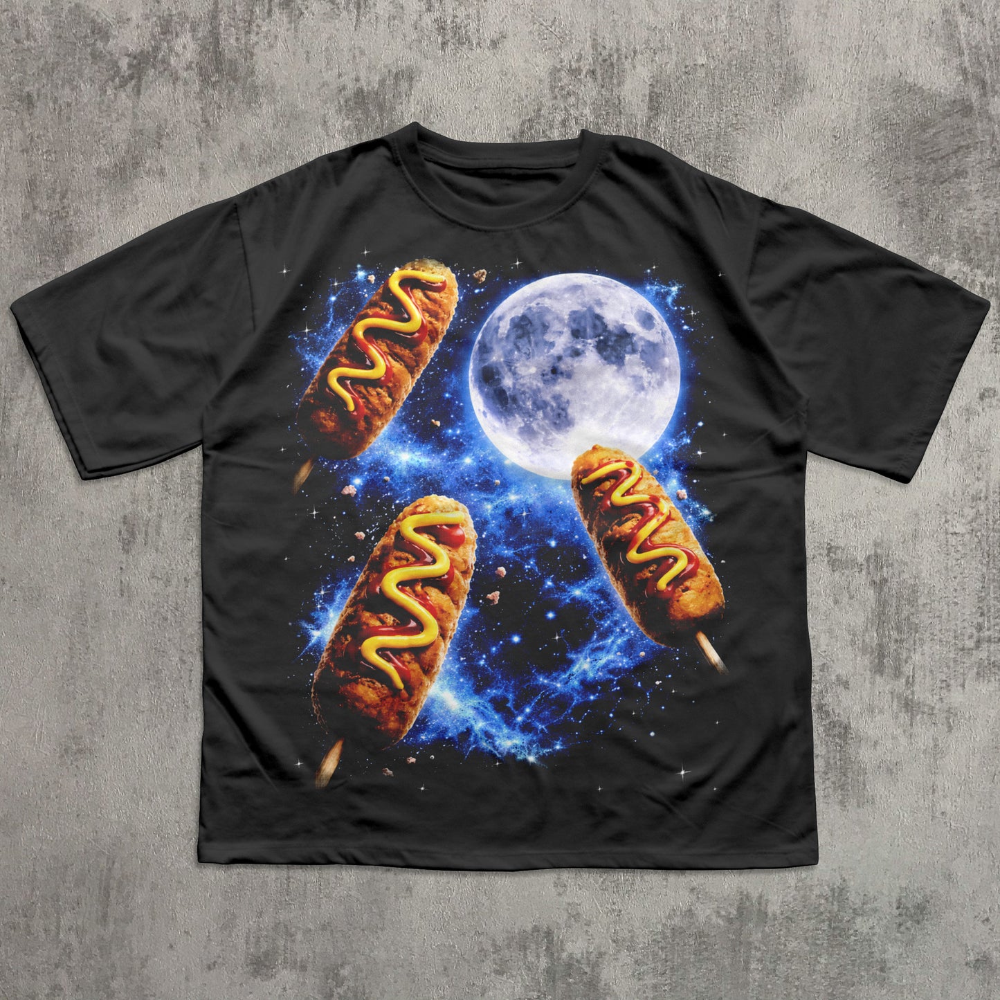 Black t-shirt with hot dog graphic against a concrete wall