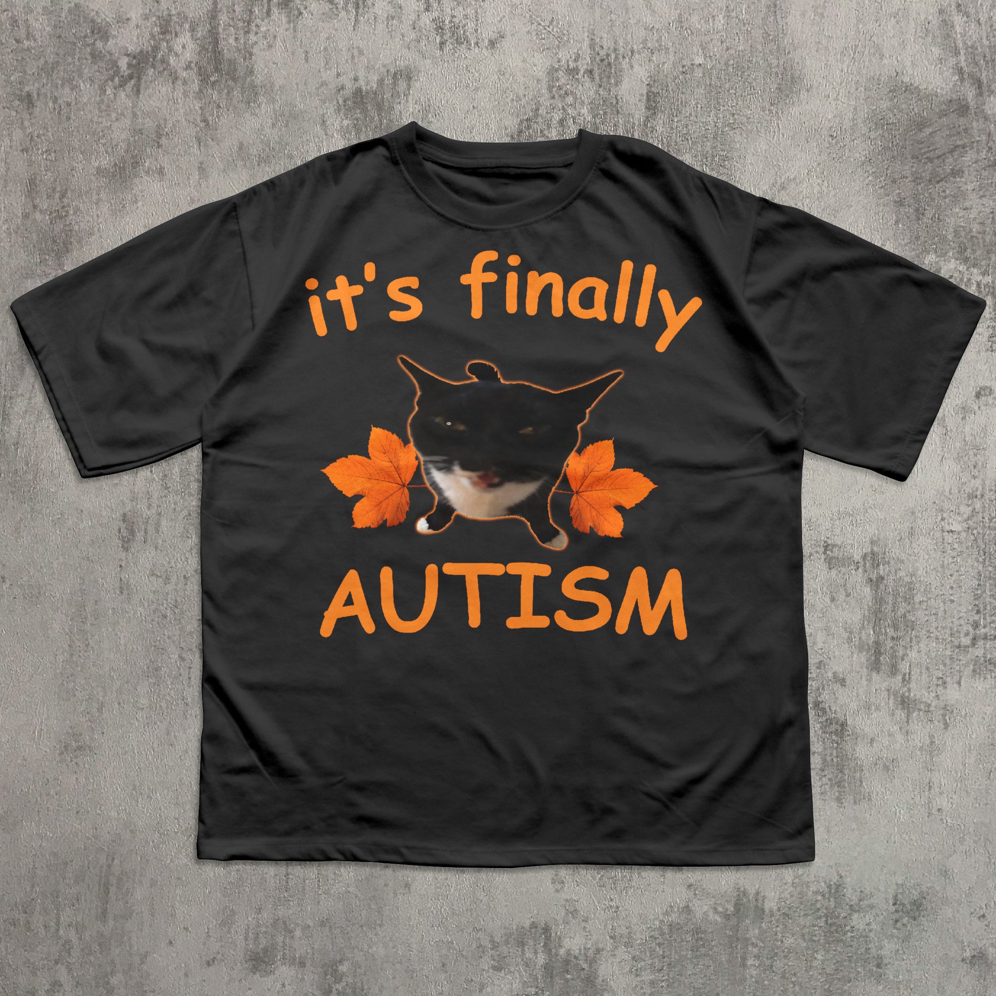 Black t-shirt with orange text and a dog graphic on a textured gray background