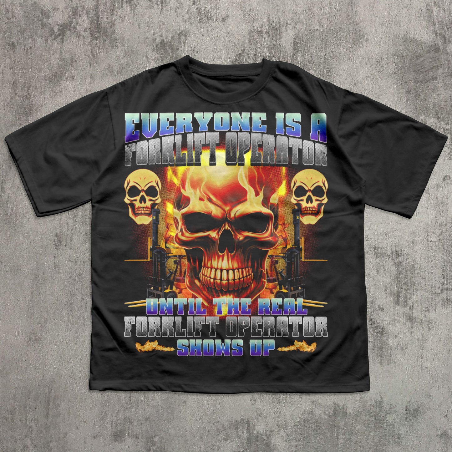 Black t-shirt with a graphic design featuring skulls and text on a concrete background