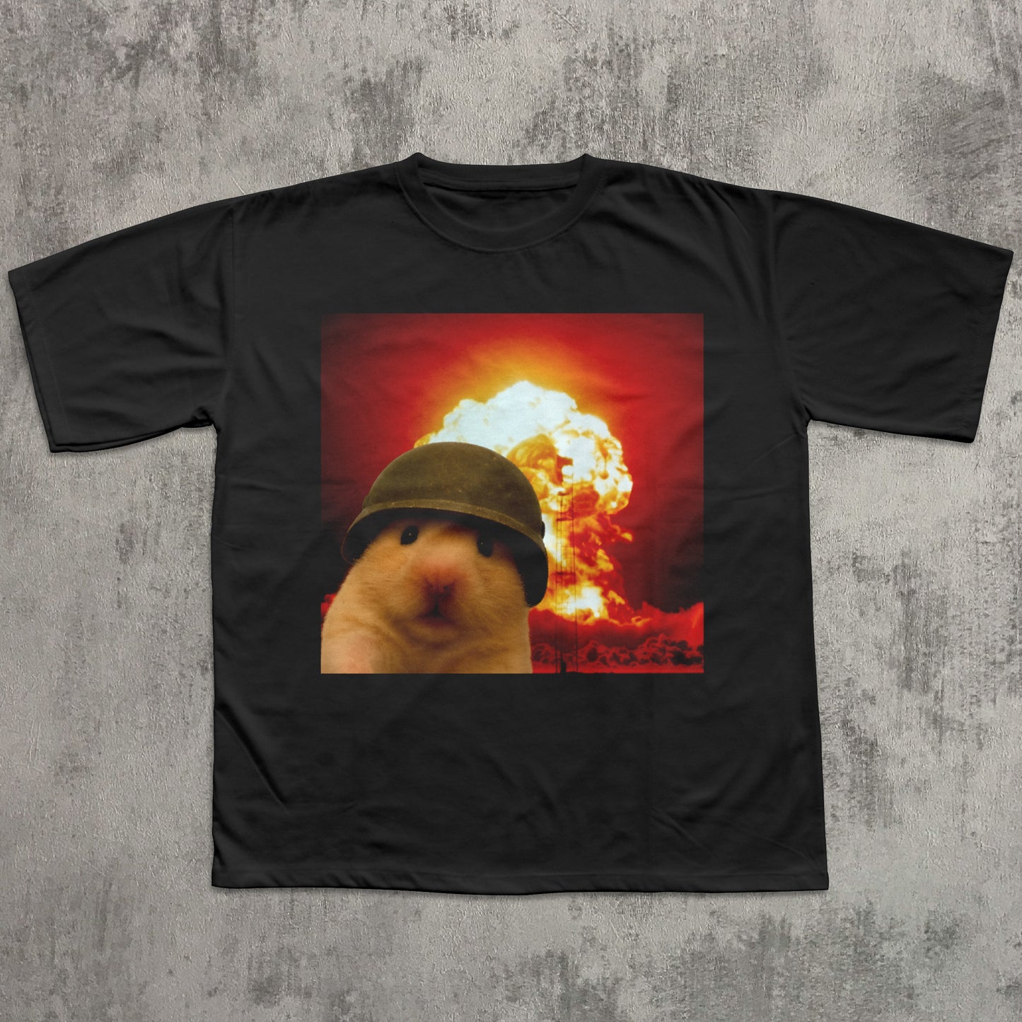 Black t-shirt with a graphic of a person wearing a helmet in front of an explosion on a textured gray background
