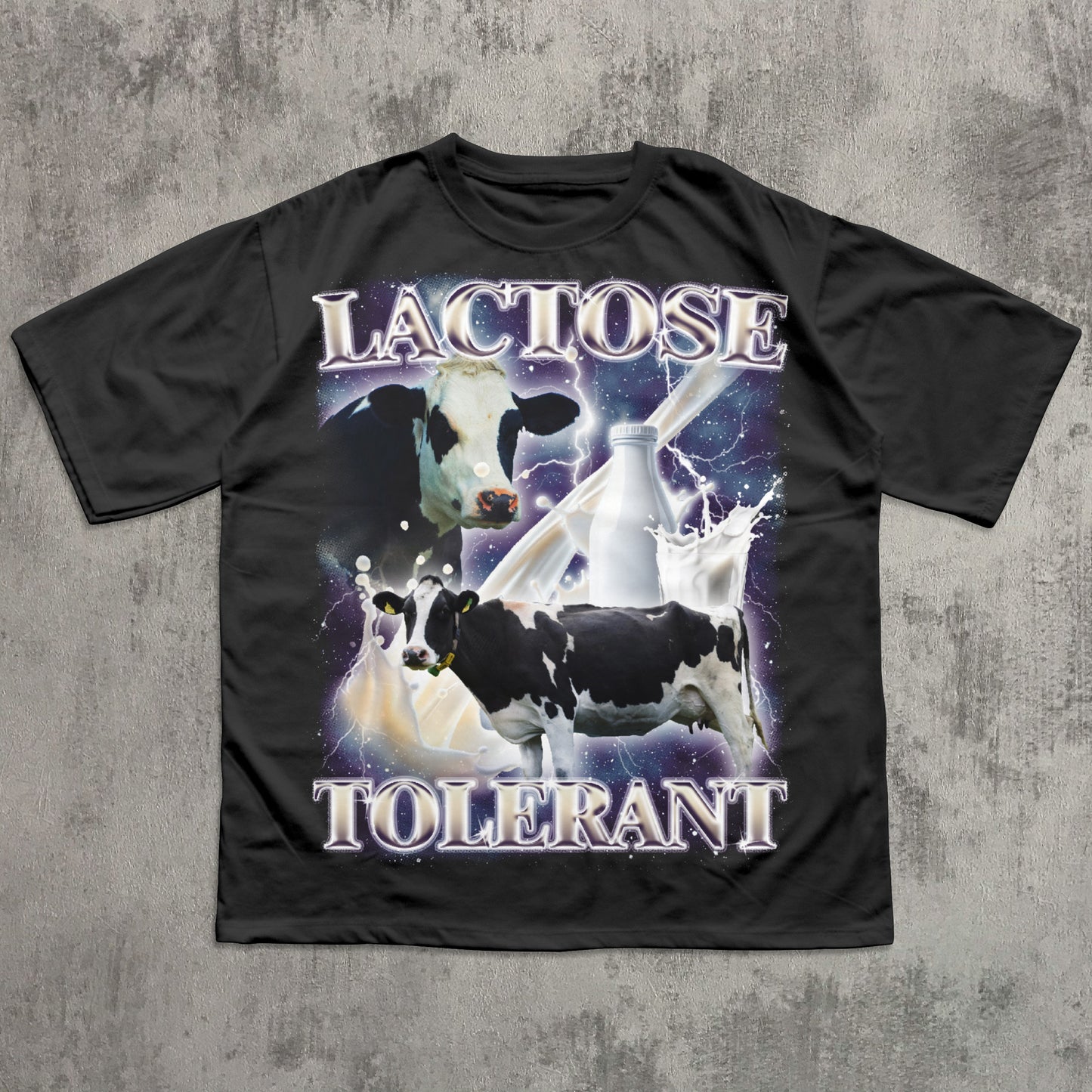 Funny Black t-shirt with cow graphic and 'Lactose Tolerant' text on a concrete surface