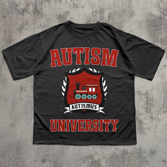 Black t-shirt with 'Autism University' design featuring a red train graphic on a textured gray background