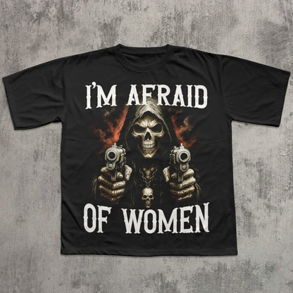 Black t-shirt with a graphic of a skeleton holding guns and text 'I'm Afraid of Women' on a textured gray background.