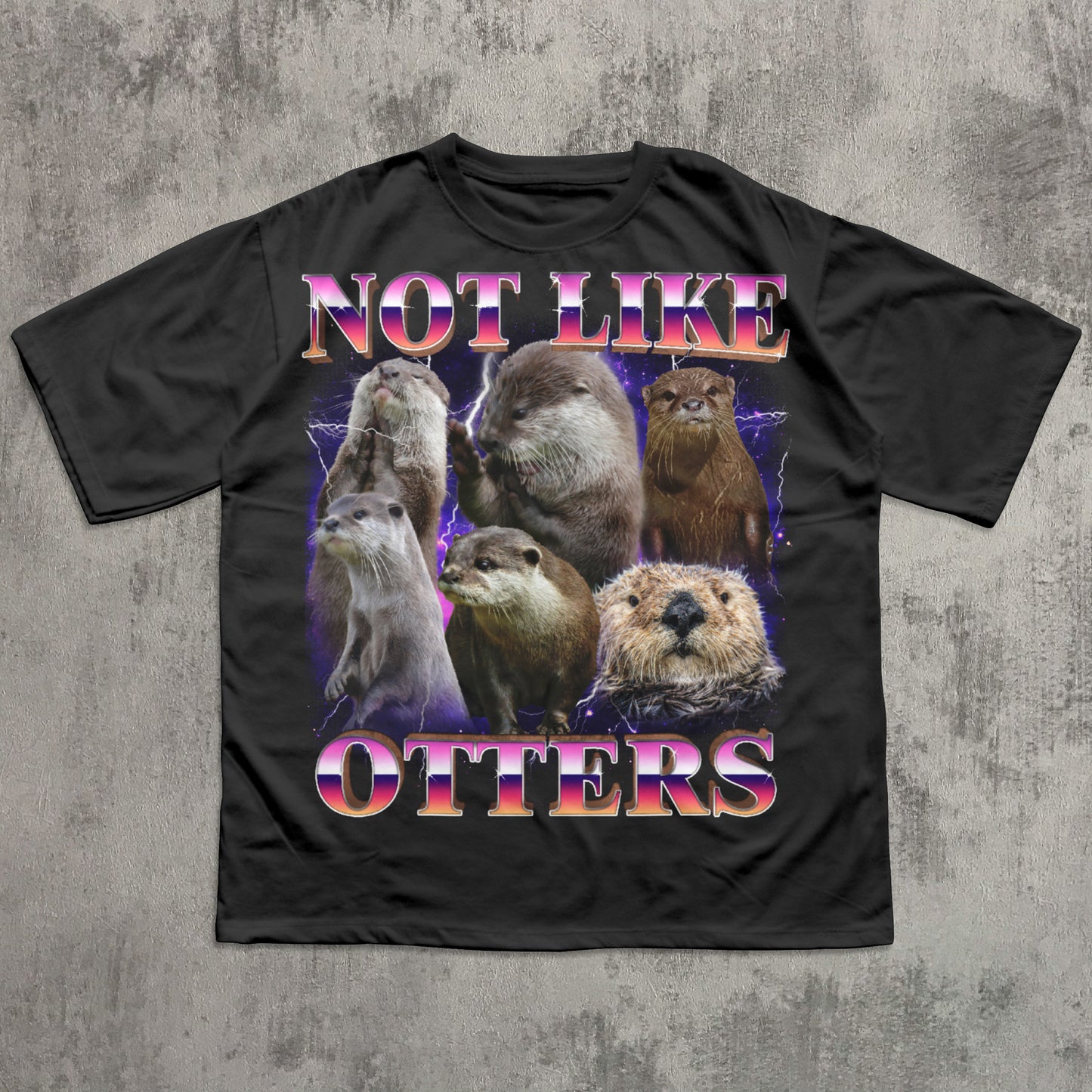 Black t-shirt with otter graphic and 'Not Like Otters' text on a textured gray background