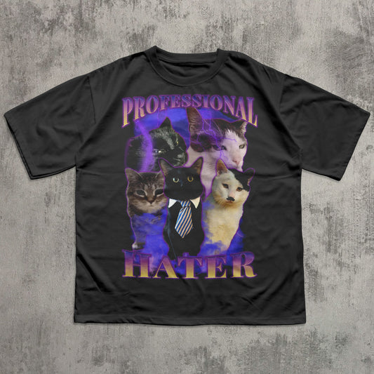 Black t-shirt with cat graphic and 'Professional Hater' text on a textured gray background