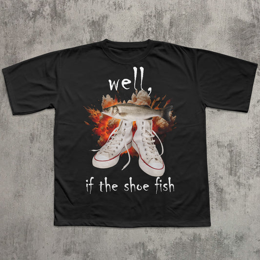 Black t-shirt with graphic design of sneakers and text on a textured gray background