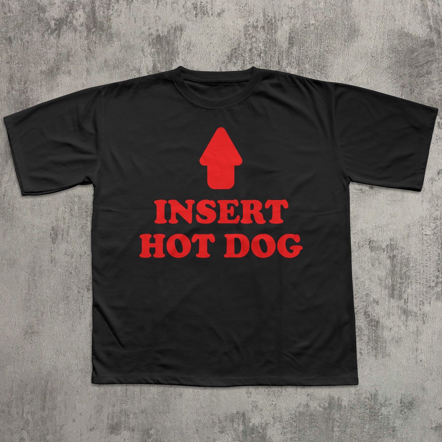 Black t-shirt with red graphic and text 'Insert Hot Dog' on a textured gray background