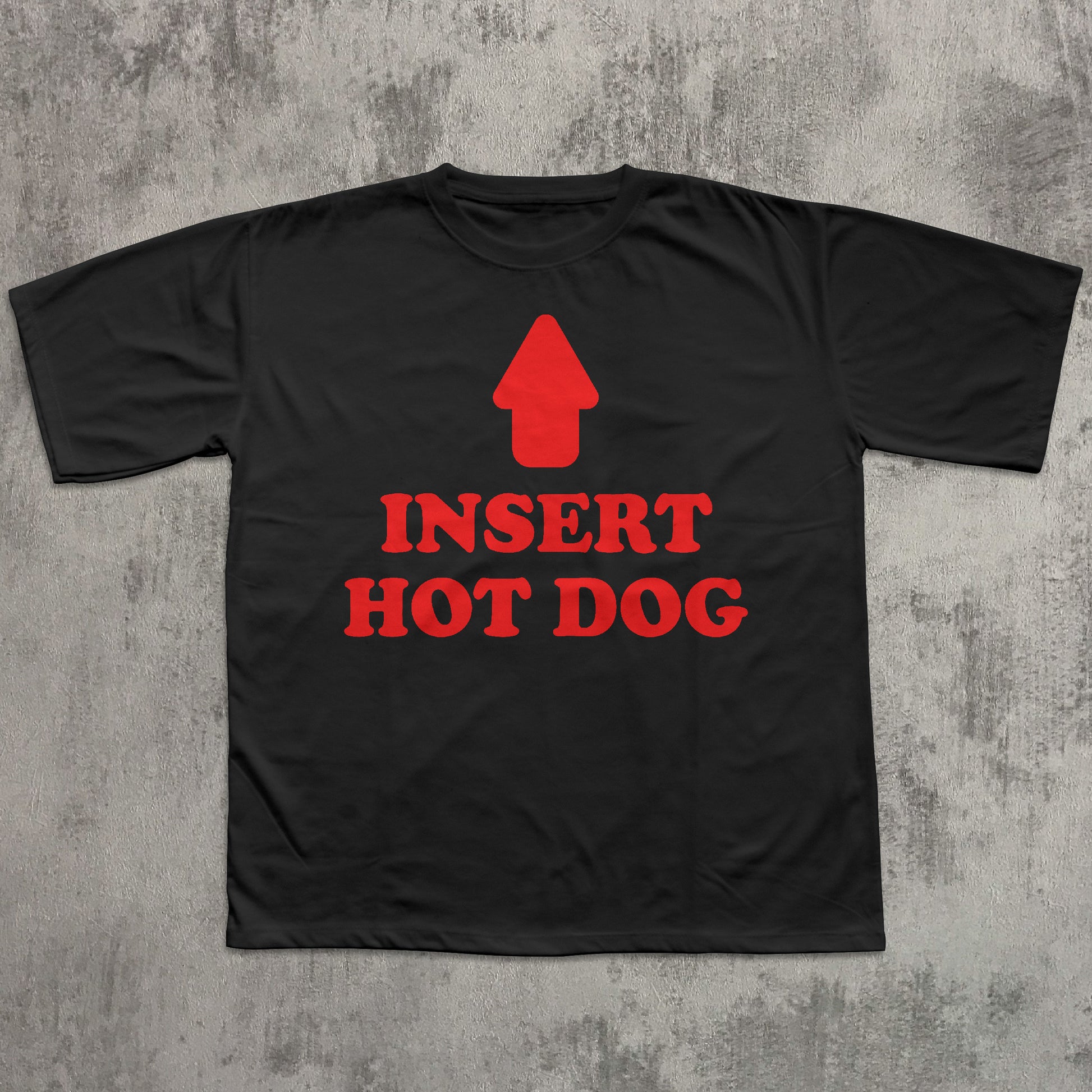 Black t-shirt with red graphic and text 'Insert Hot Dog' on a textured gray background