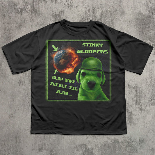 Black t-shirt with a graphic design featuring a funny green alien dog and text on a concrete background