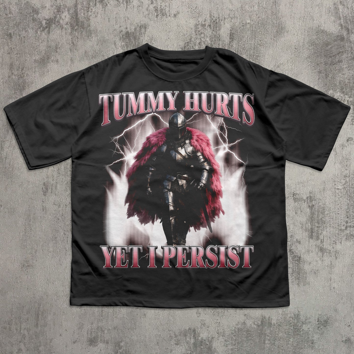 Black t-shirt with warrior graphic and text 'Tummy Hurts Yet I Persist' on a textured gray background