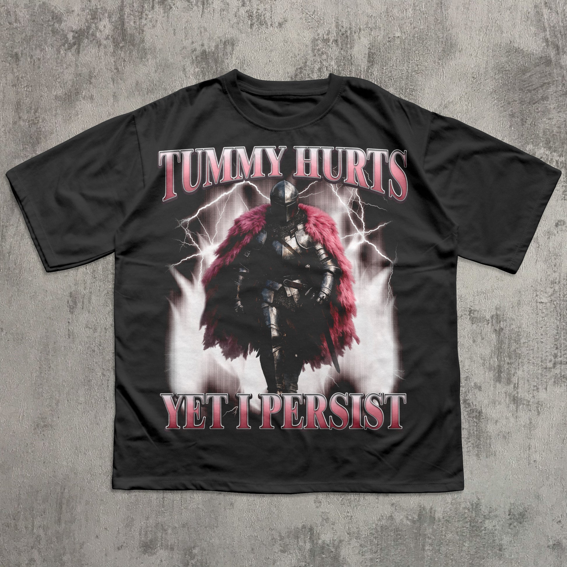 Black t-shirt with warrior graphic and text 'Tummy Hurts Yet I Persist' on a textured gray background