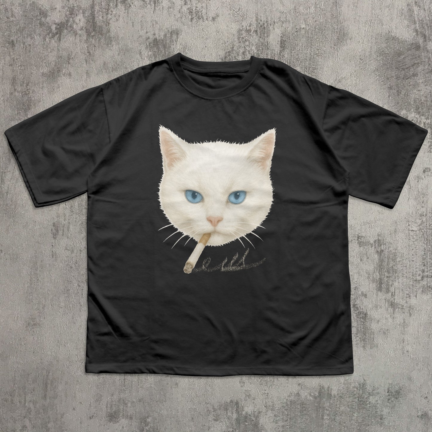 Black t-shirt with a graphic of a white cat with blue eyes on a textured gray background
