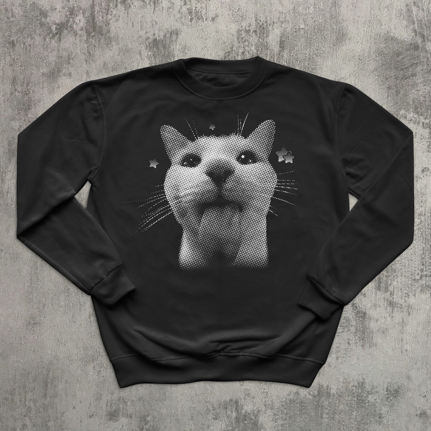 Black sweatshirt with a cat graphic on a textured gray background