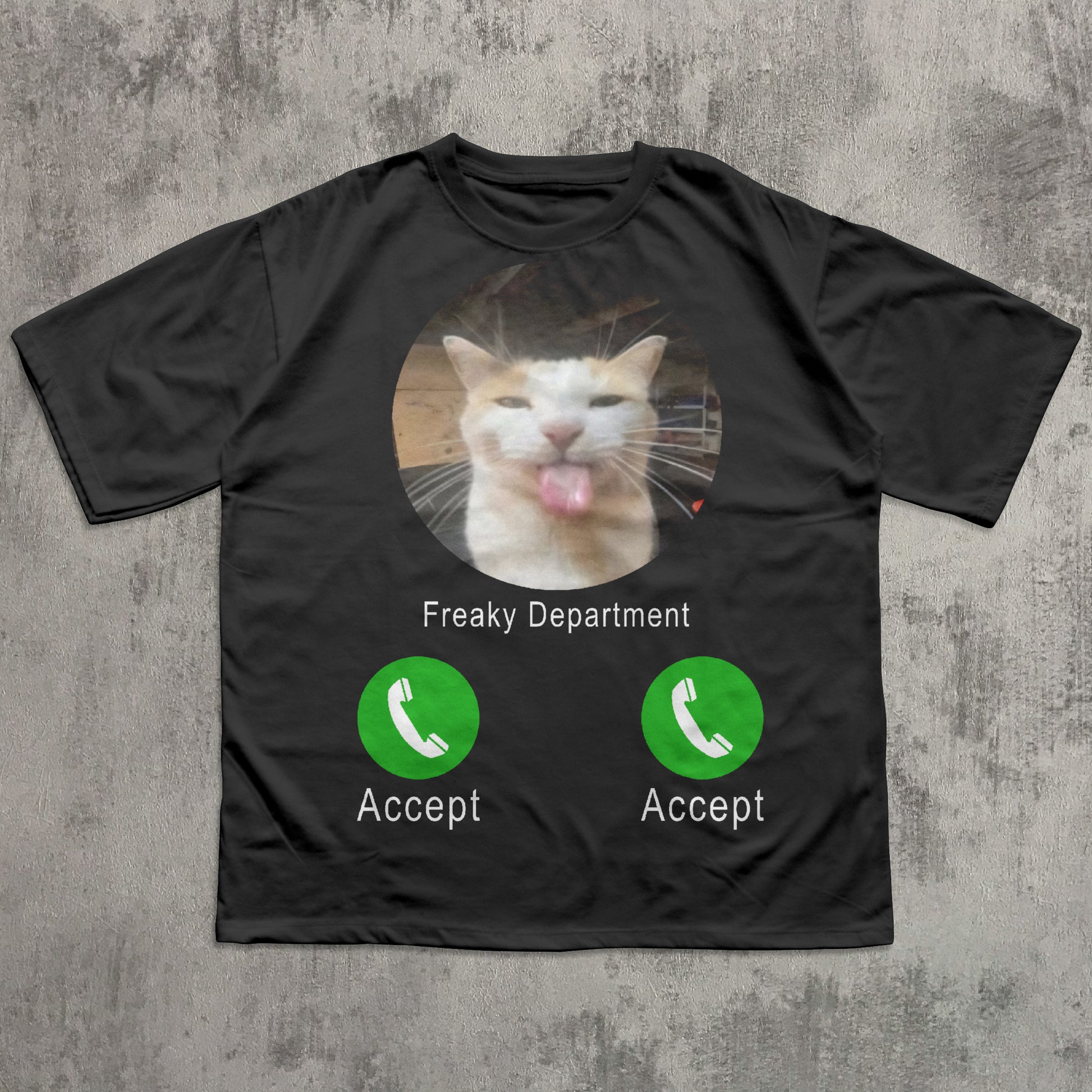 Black t-shirt with a cat graphic and 'Freaky Department' text on a textured gray background