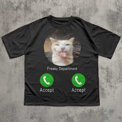 Black t-shirt with a cat graphic and 'Freaky Department' text on a textured gray background