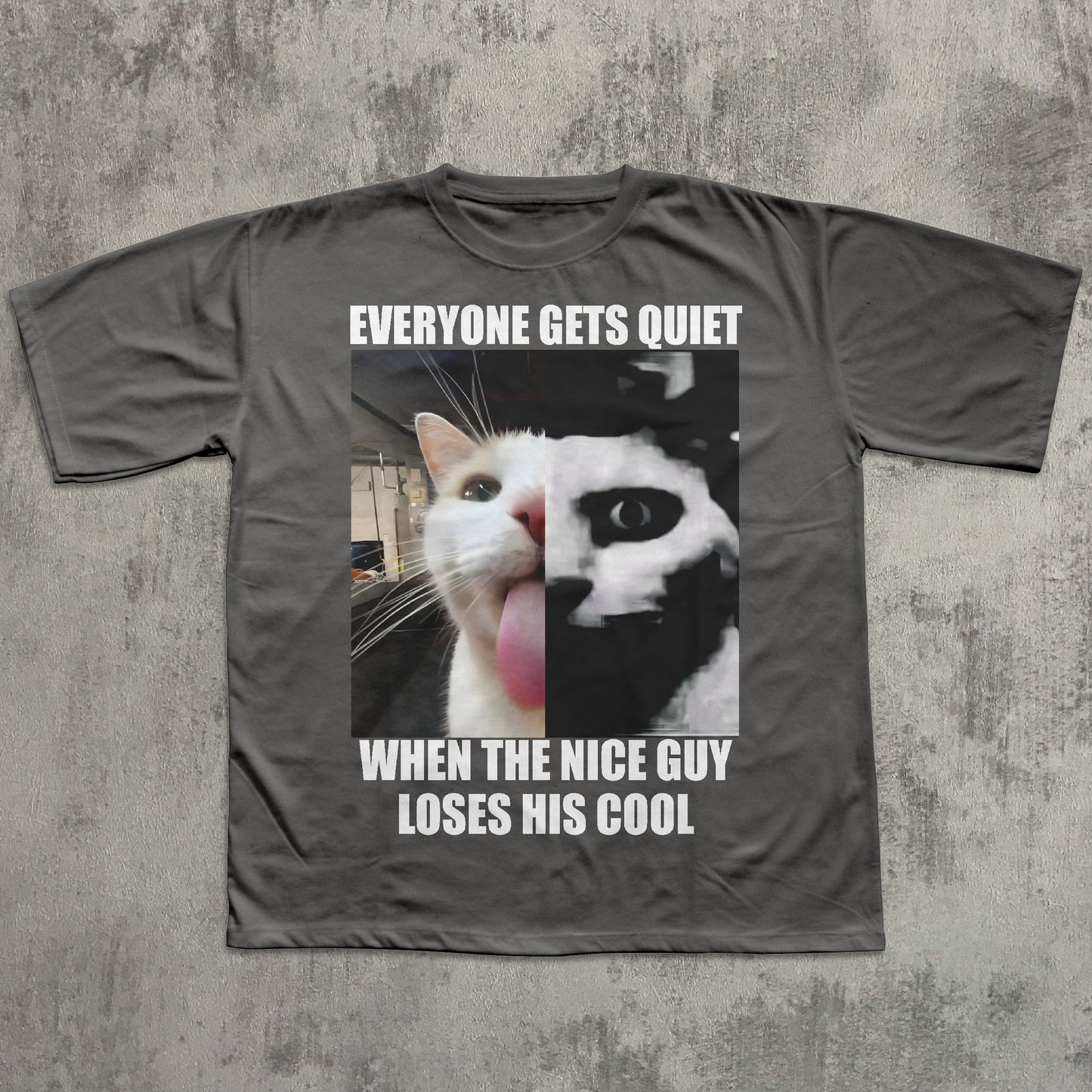 Gray t-shirt with a graphic of a cat and text on a textured gray background